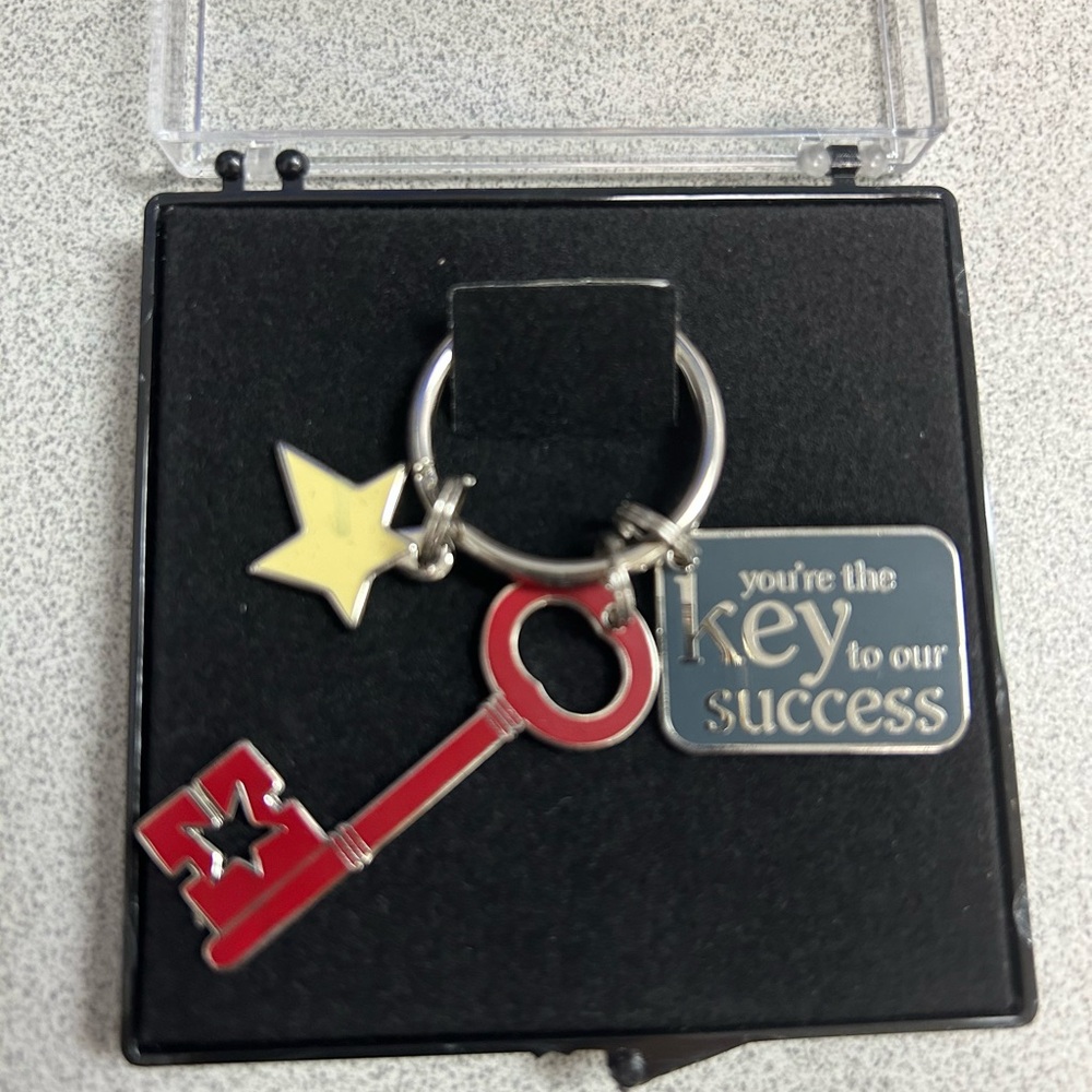 NWOT Red and Gold Keychain with Star Charm